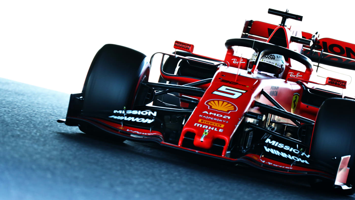 SUZUKA, JAPAN - OCTOBER 13: Sebastian Vettel of Germany driving the (5) Scuderia Ferrari SF90 on