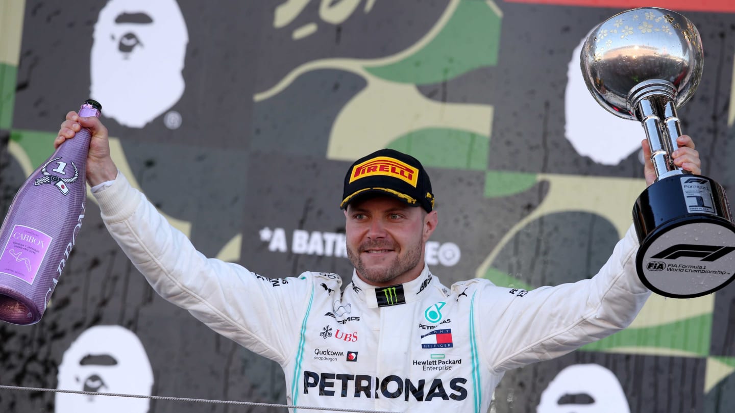SUZUKA, JAPAN - OCTOBER 13: Race winner Valtteri Bottas of Finland and Mercedes GP celebrates on