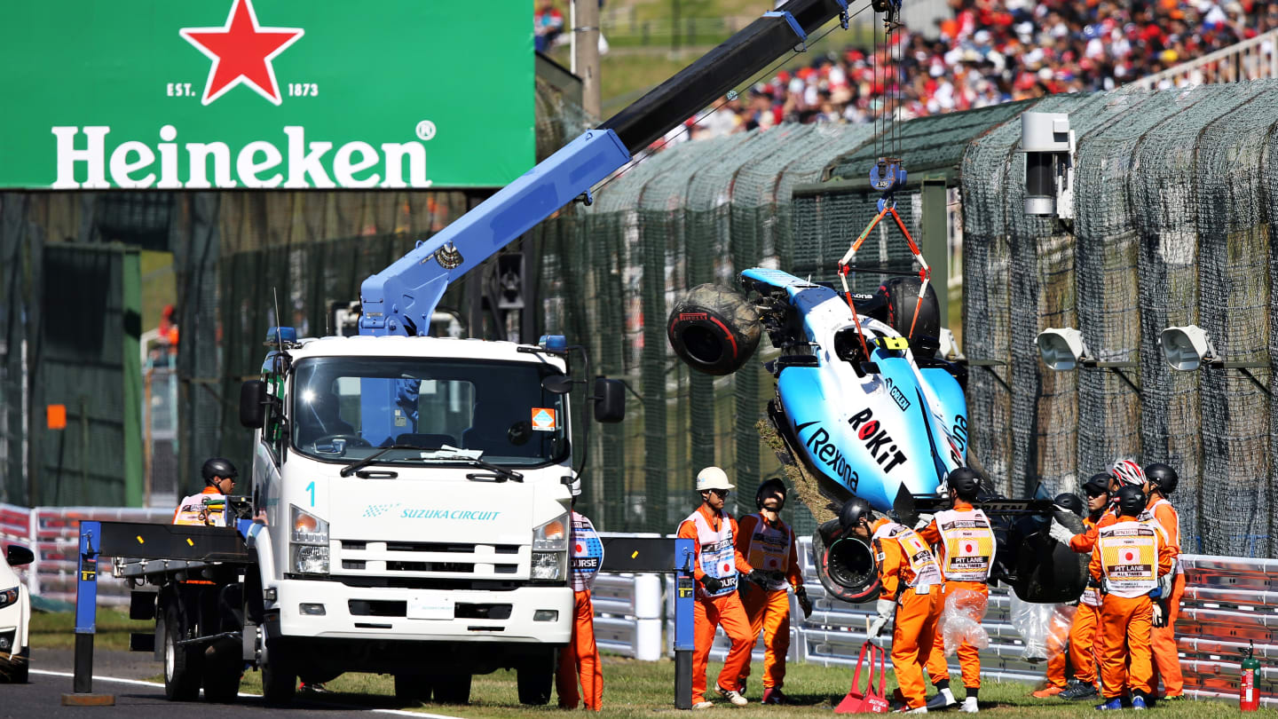 SUZUKA, JAPAN - OCTOBER 13: The car of Robert Kubica of Poland and Williams is removed from the circuit after he crashed during qualifying for the F1 Grand Prix of Japan at Suzuka Circuit on October 13, 2019 in Suzuka, Japan. (Photo by Charles Coates/Getty Images)