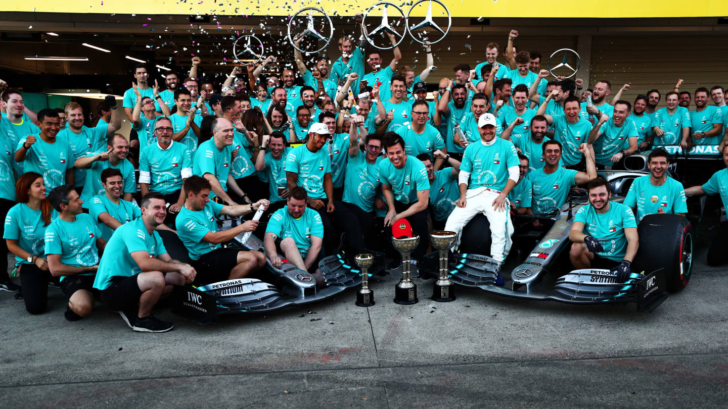 SUZUKA, JAPAN - OCTOBER 13: The Mercedes GP team celebrate winning the constructors championship