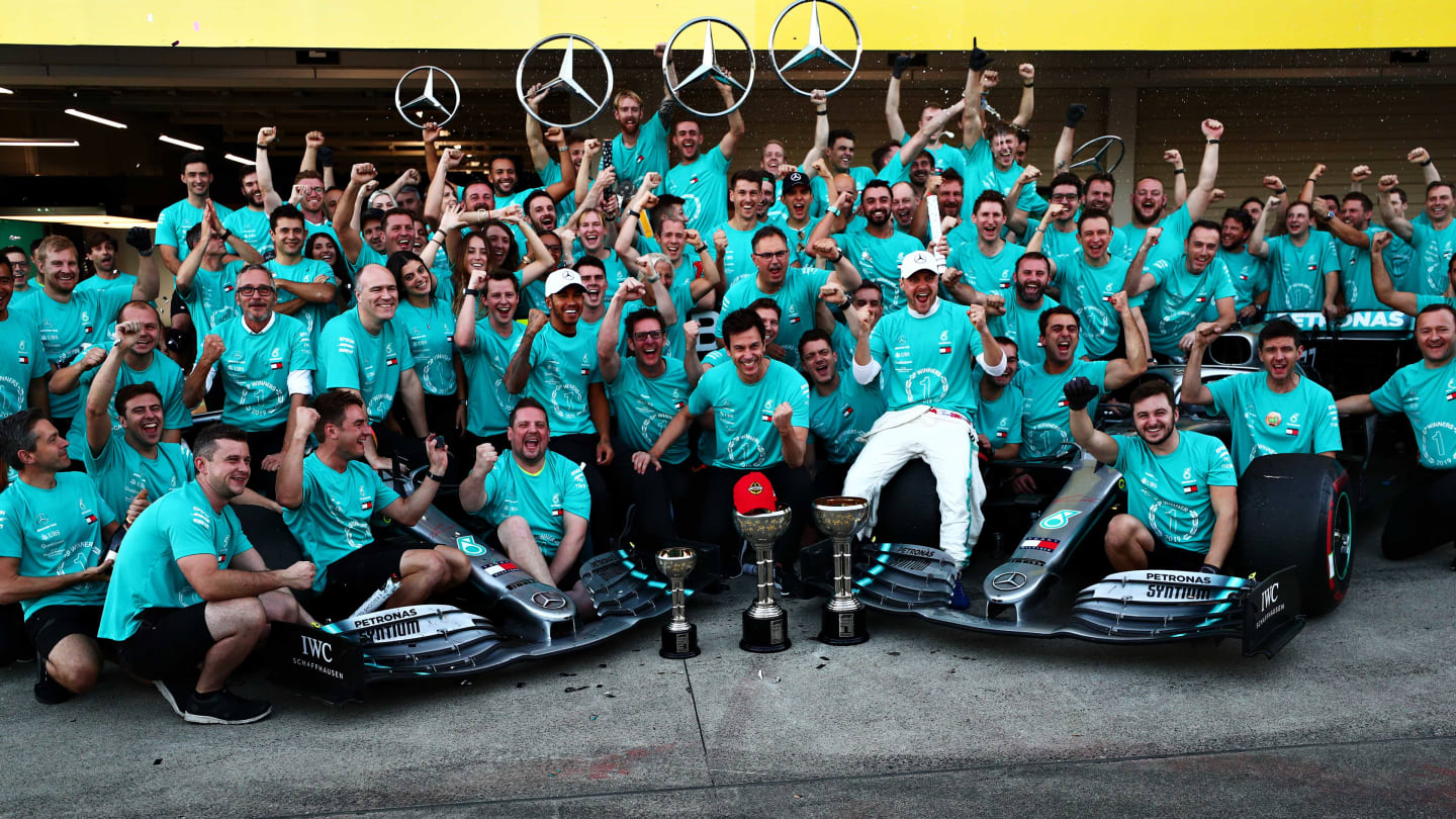 SUZUKA, JAPAN - OCTOBER 13: The Mercedes GP team celebrate winning the constructors championship