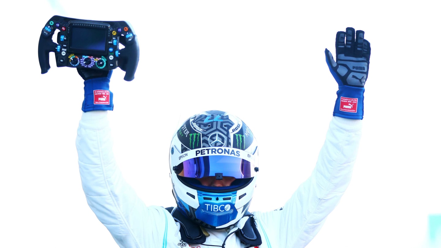 SUZUKA, JAPAN - OCTOBER 13: Race winner Valtteri Bottas of Finland and Mercedes GP celebrates in