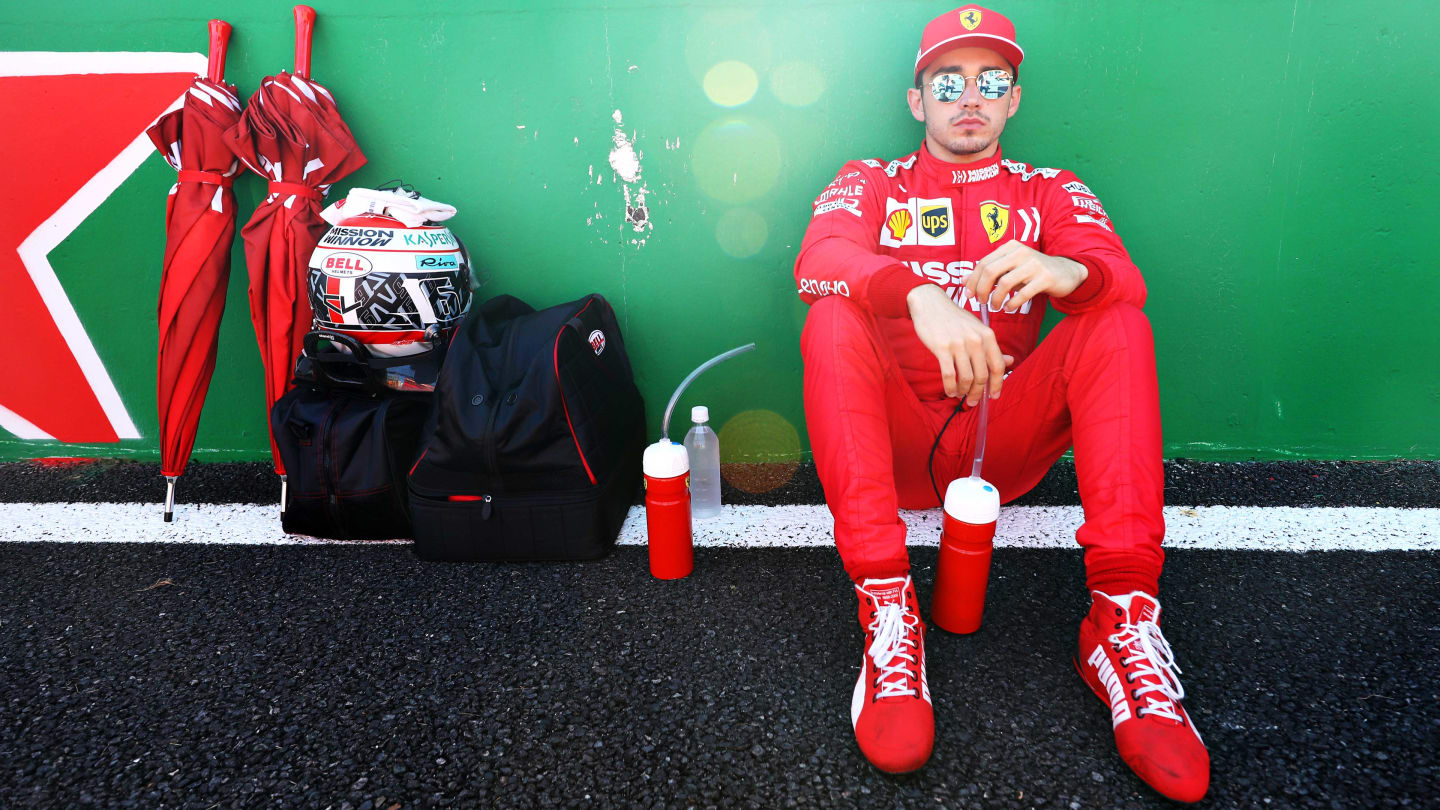 SUZUKA, JAPAN - OCTOBER 13: Charles Leclerc of Monaco and Ferrari prepares to drive on the grid