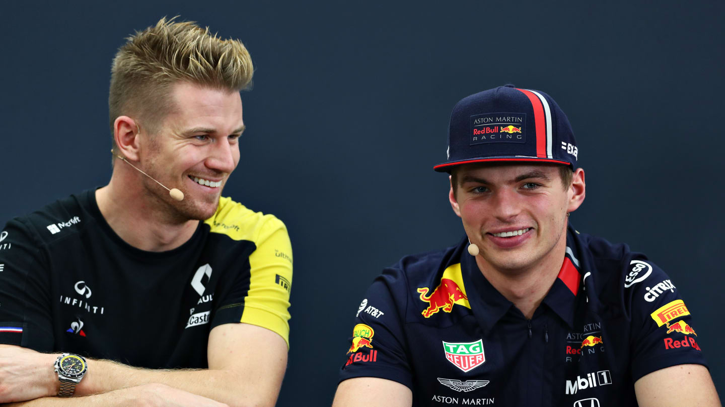 SUZUKA, JAPAN - OCTOBER 10: Nico Hulkenberg of Germany and Renault Sport F1 and Max Verstappen of Netherlands and Red Bull Racing talk in the Drivers Press Conference during previews ahead of the F1 Grand Prix of Japan at Suzuka Circuit on October 10, 2019 in Suzuka, Japan. (Photo by Dan Istitene/Getty Images)