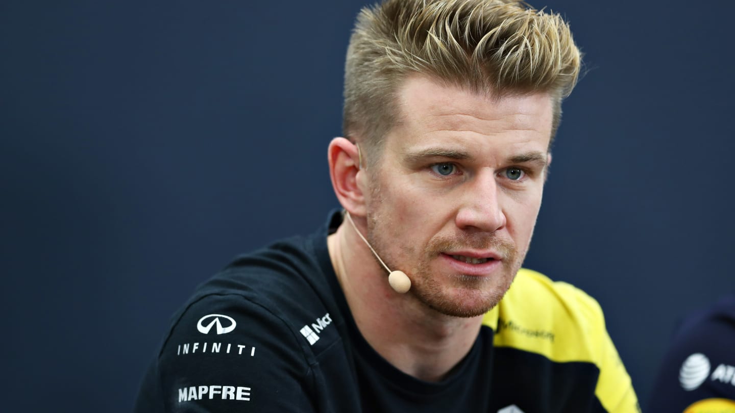 SUZUKA, JAPAN - OCTOBER 10: Nico Hulkenberg of Germany and Renault Sport F1 talks in the Drivers