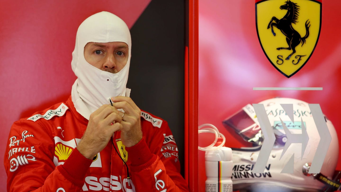 MEXICO CITY, MEXICO - OCTOBER 25: Sebastian Vettel of Germany and Ferrari prepares to drive in the