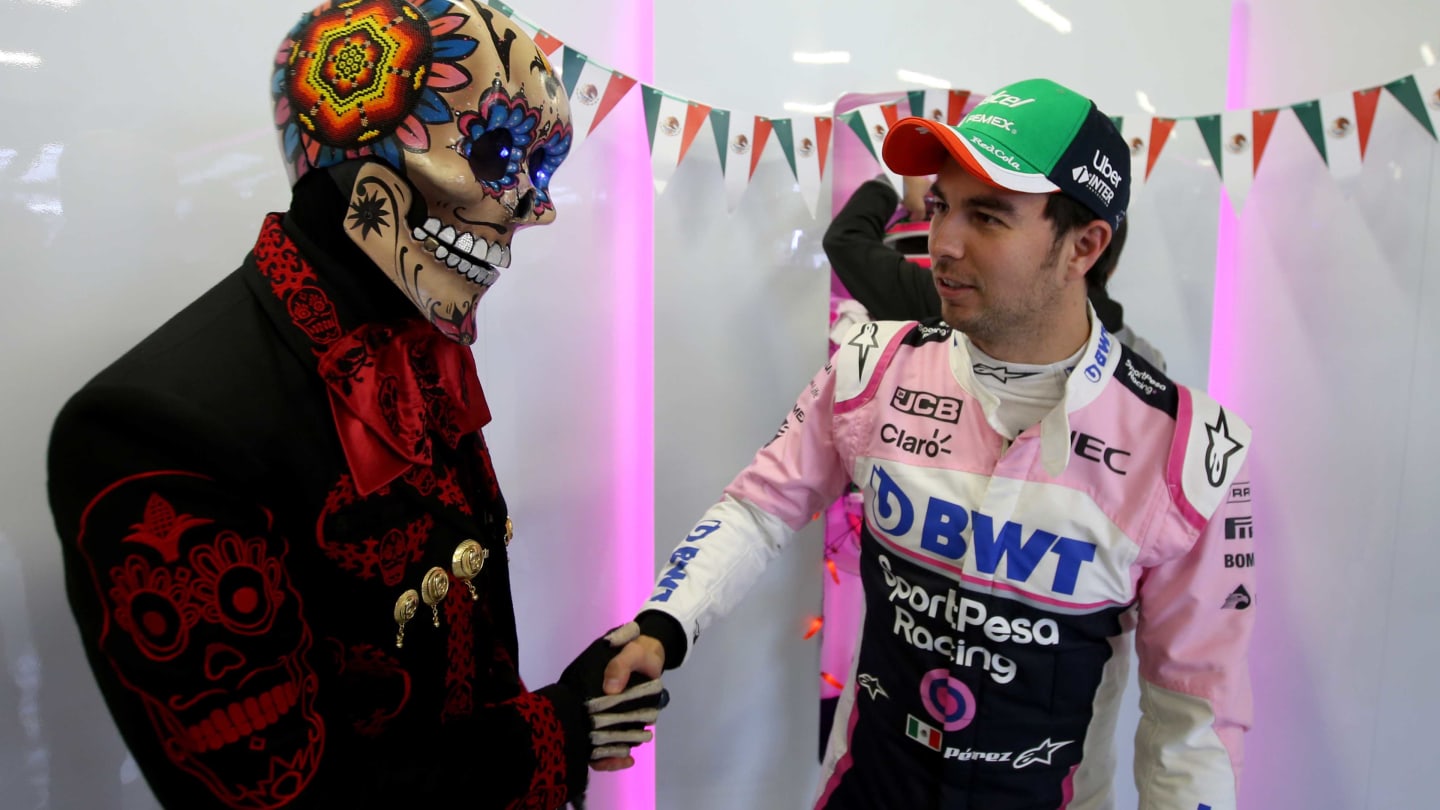 MEXICO CITY, MEXICO - OCTOBER 26: Sergio Perez of Mexico and Racing Point talks with a Mexican