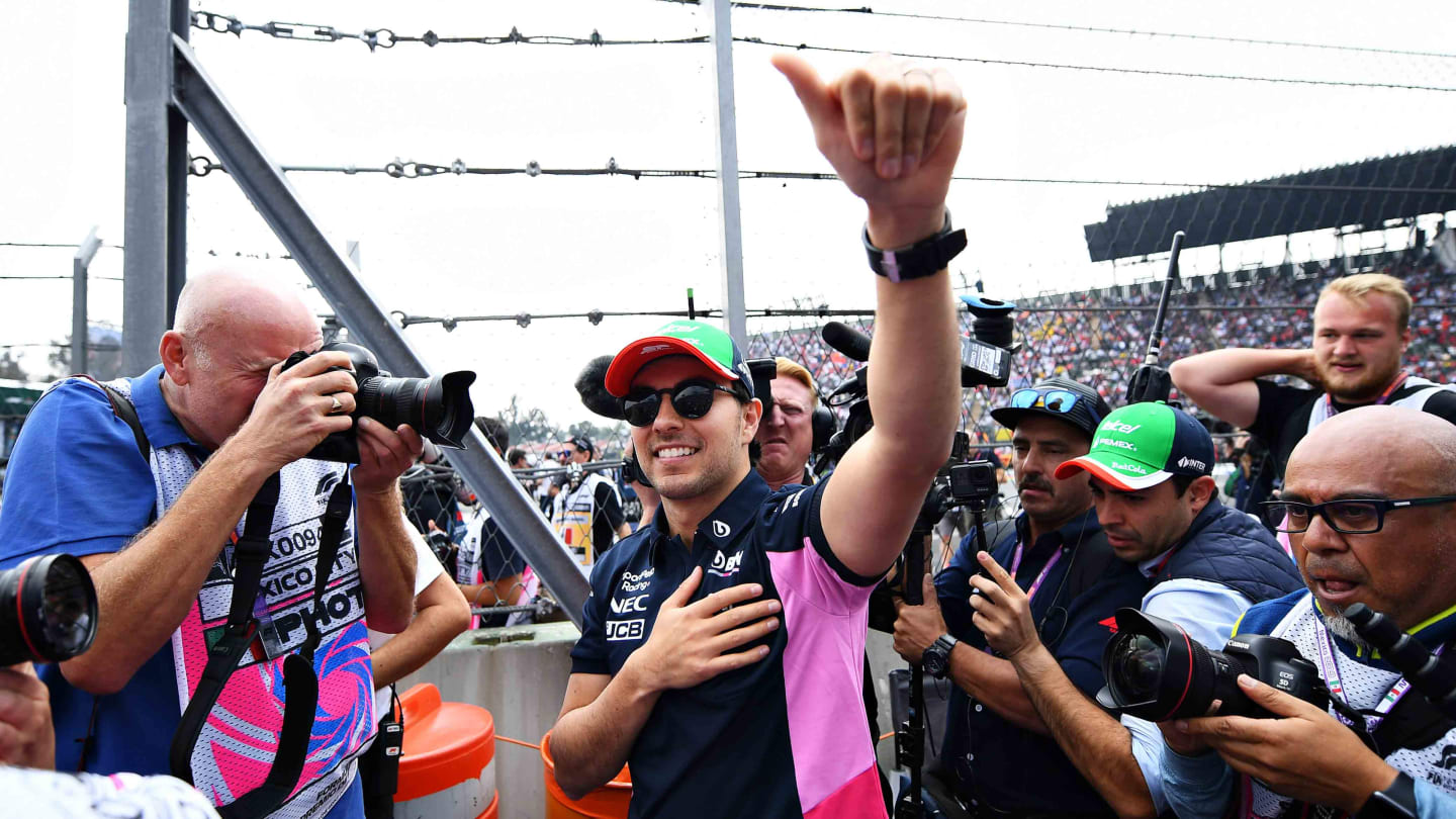 MEXICO CITY, MEXICO - OCTOBER 27: Sergio Perez of Mexico and Racing Point waves to the crowd on the drivers parade before the F1 Grand Prix of Mexico at Autodromo Hermanos Rodriguez on October 27, 2019 in Mexico City, Mexico. (Photo by Clive Mason/Getty Images)