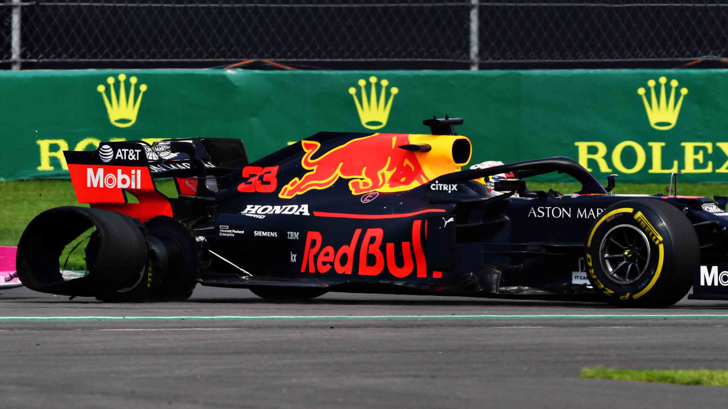 MEXICO CITY, MEXICO - OCTOBER 27: Max Verstappen of the Netherlands driving the (33) Aston Martin Red Bull Racing RB15 loses his right rear tyre to a puncture during the F1 Grand Prix of Mexico at Autodromo Hermanos Rodriguez on October 27, 2019 in Mexico City, Mexico. (Photo by Clive Mason/Getty Images)