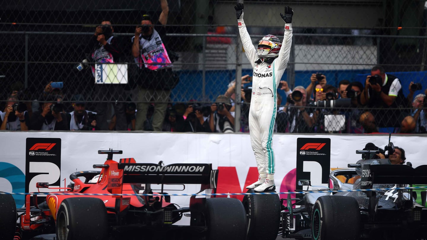 MEXICO CITY, MEXICO - OCTOBER 27: Race winner Lewis Hamilton of Great Britain and Mercedes GP celebrates in parc ferme during the F1 Grand Prix of Mexico at Autodromo Hermanos Rodriguez on October 27, 2019 in Mexico City, Mexico. (Photo by Clive Mason/Getty Images)