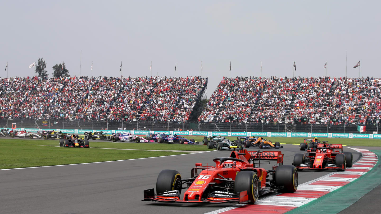 MEXICO CITY, MEXICO - OCTOBER 27: Charles Leclerc of Monaco driving the (16) Scuderia Ferrari SF90 leads Sebastian Vettel of Germany driving the (5) Scuderia Ferrari SF90 at the start during the F1 Grand Prix of Mexico at Autodromo Hermanos Rodriguez on October 27, 2019 in Mexico City, Mexico. (Photo by Charles Coates/Getty Images)