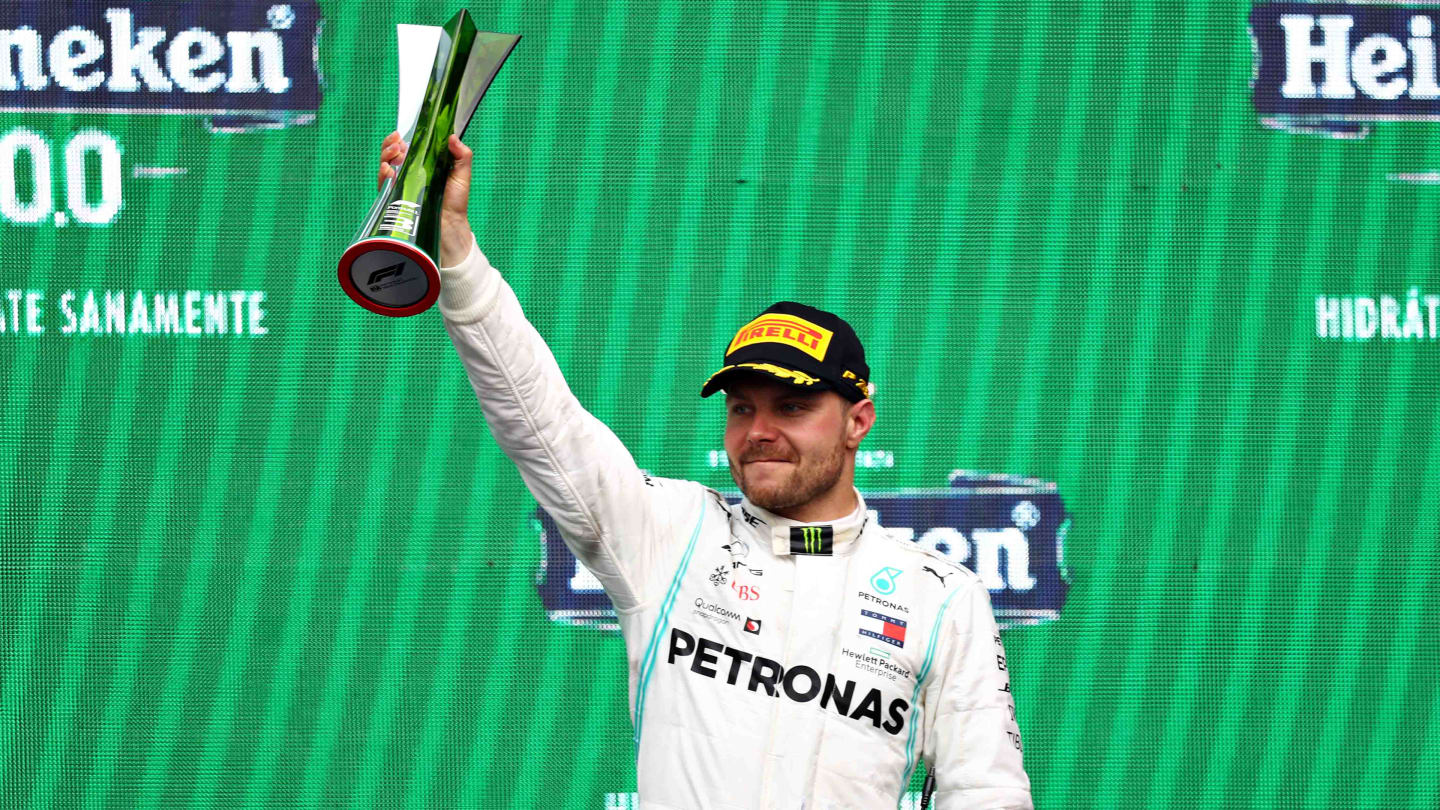 MEXICO CITY, MEXICO - OCTOBER 27: Third placed Valtteri Bottas of Finland and Mercedes GP celebrates on the podium during the F1 Grand Prix of Mexico at Autodromo Hermanos Rodriguez on October 27, 2019 in Mexico City, Mexico. (Photo by Mark Thompson/Getty Images)