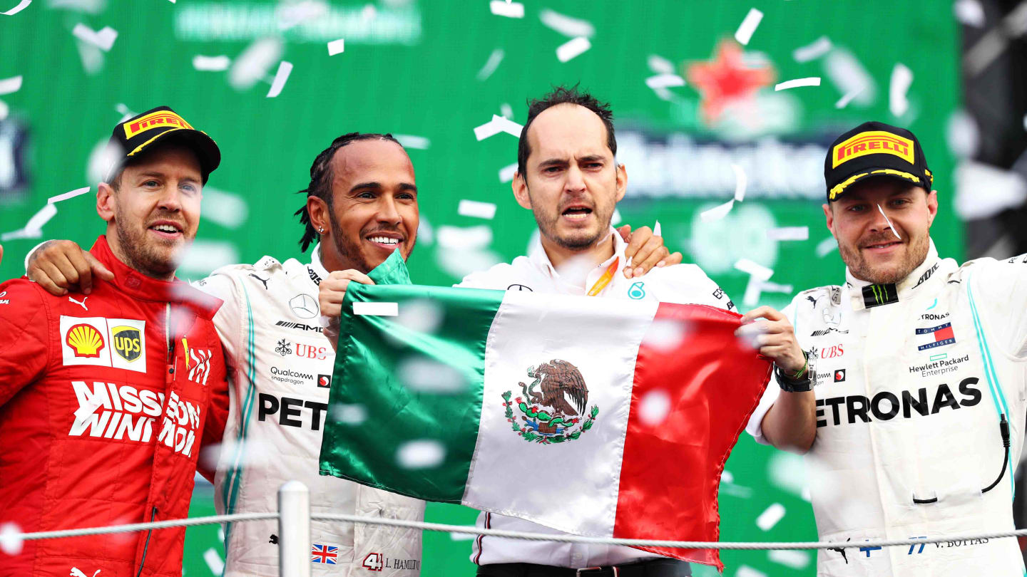 MEXICO CITY, MEXICO - OCTOBER 27: Top three finishers Lewis Hamilton of Great Britain and Mercedes