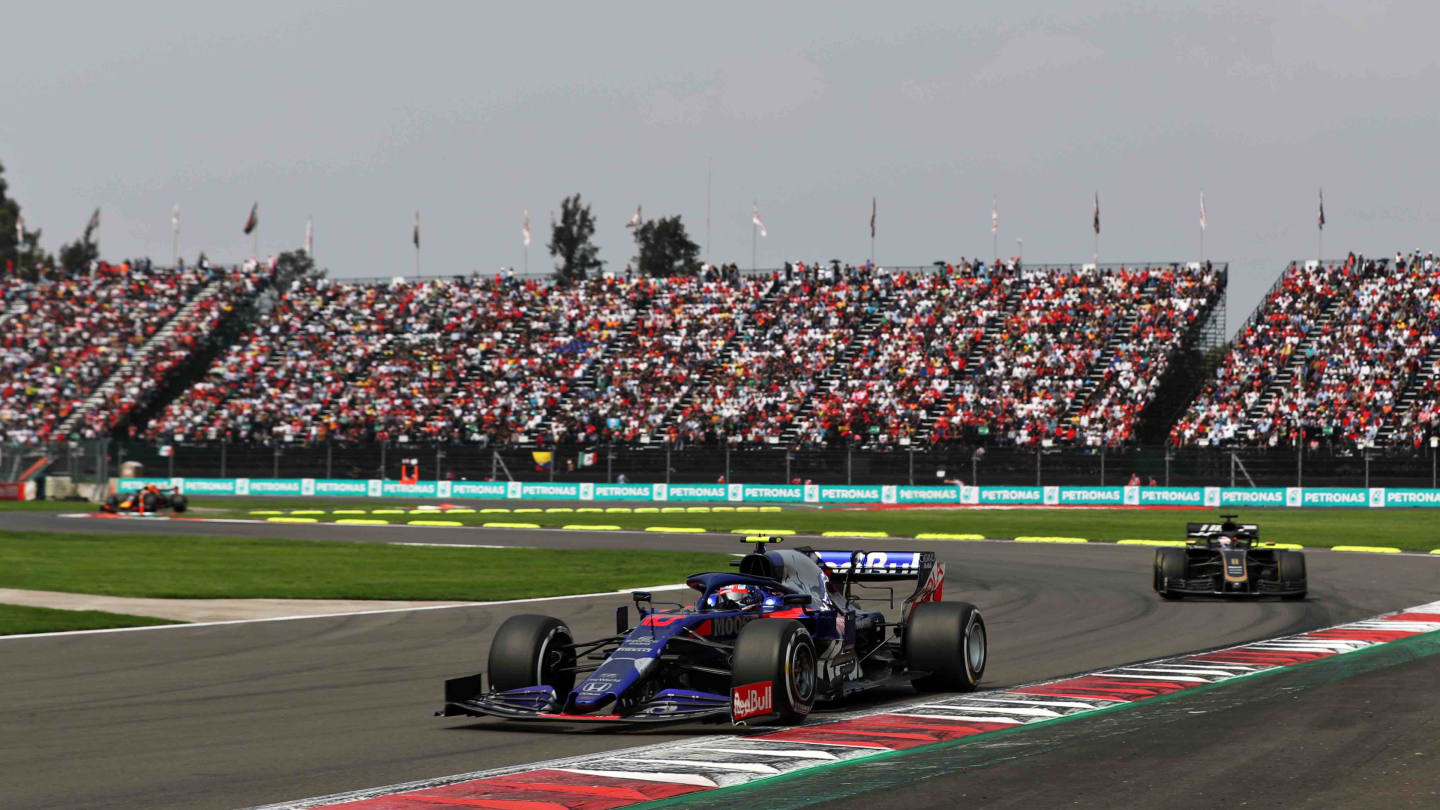 MEXICO CITY, MEXICO - OCTOBER 27: Pierre Gasly of France driving the (10) Scuderia Toro Rosso STR14 Honda leads Romain Grosjean of France driving the (8) Haas F1 Team VF-19 Ferrari on track during the F1 Grand Prix of Mexico at Autodromo Hermanos Rodriguez on October 27, 2019 in Mexico City, Mexico. (Photo by Mark Thompson/Getty Images)