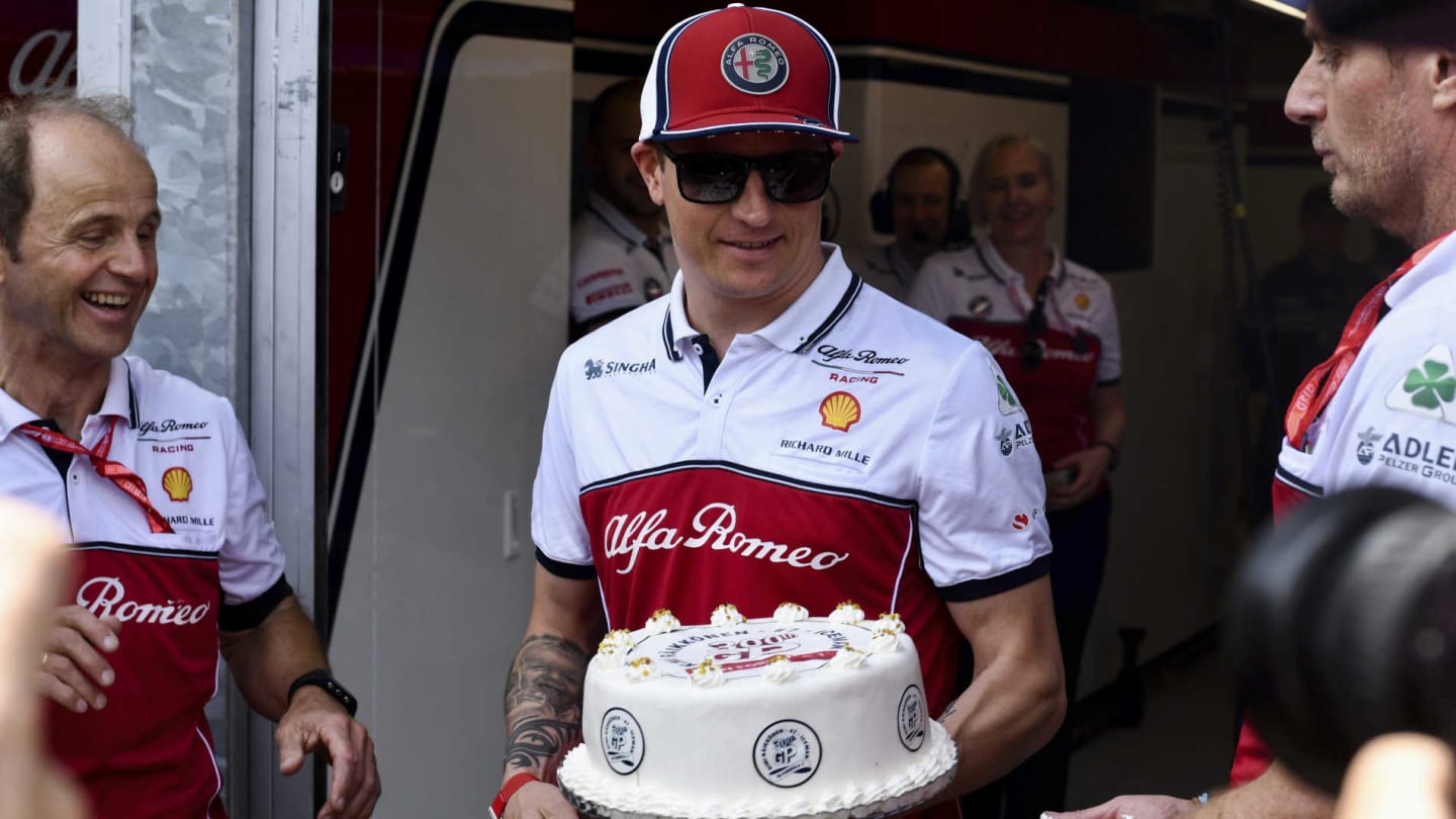 MONTE CARLO, MONACO - MAY 26: Kimi Raikkonen, Alfa Romeo Racing, is presented with a cake to commemorate his 300th race during the Monaco GP at Monte Carlo on May 26, 2019 in Monte Carlo, Monaco. (Photo by Jerry Andre / Sutton Images)