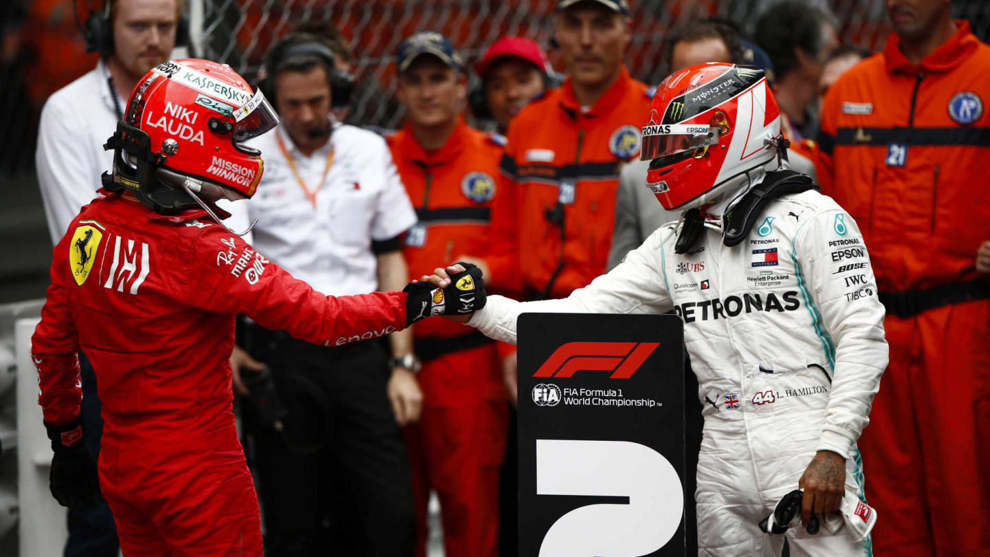 MONTE CARLO, MONACO - MAY 26: Sebastian Vettel, Ferrari, 2nd position, congratulates Lewis Hamilton, Mercedes AMG F1, 1st position, in Parc Ferme during the Monaco GP at Monte Carlo on May 26, 2019 in Monte Carlo, Monaco. (Photo by Andy Hone / LAT Images)