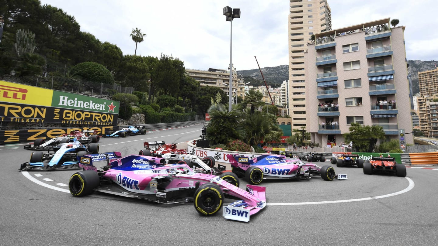 MONTE CARLO, MONACO - MAY 26: Lance Stroll, Racing Point RP19, leads Kimi Raikkonen, Alfa Romeo Racing C38, and Sergio Perez, Racing Point RP19 during the Monaco GP at Monte Carlo on May 26, 2019 in Monte Carlo, Monaco. (Photo by Gareth Harford / Sutton Images)