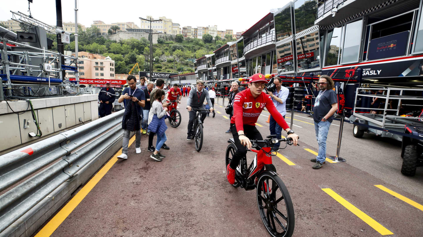 MONTE CARLO, MONACO - MAY 22: Charles Leclerc, Ferrari on a bike in the pit lane during the Monaco