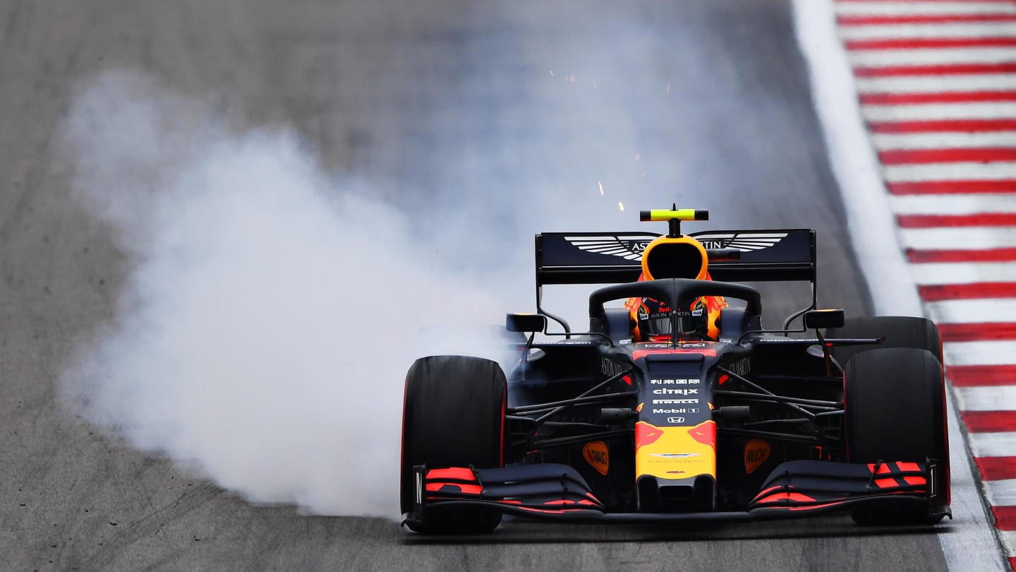 SOCHI, RUSSIA - SEPTEMBER 27: Alexander Albon of Thailand driving the (23) Aston Martin Red Bull Racing RB15 locks a wheel under braking during practice for the F1 Grand Prix of Russia at Sochi Autodrom on September 27, 2019 in Sochi, Russia. (Photo by Clive Mason/Getty Images)