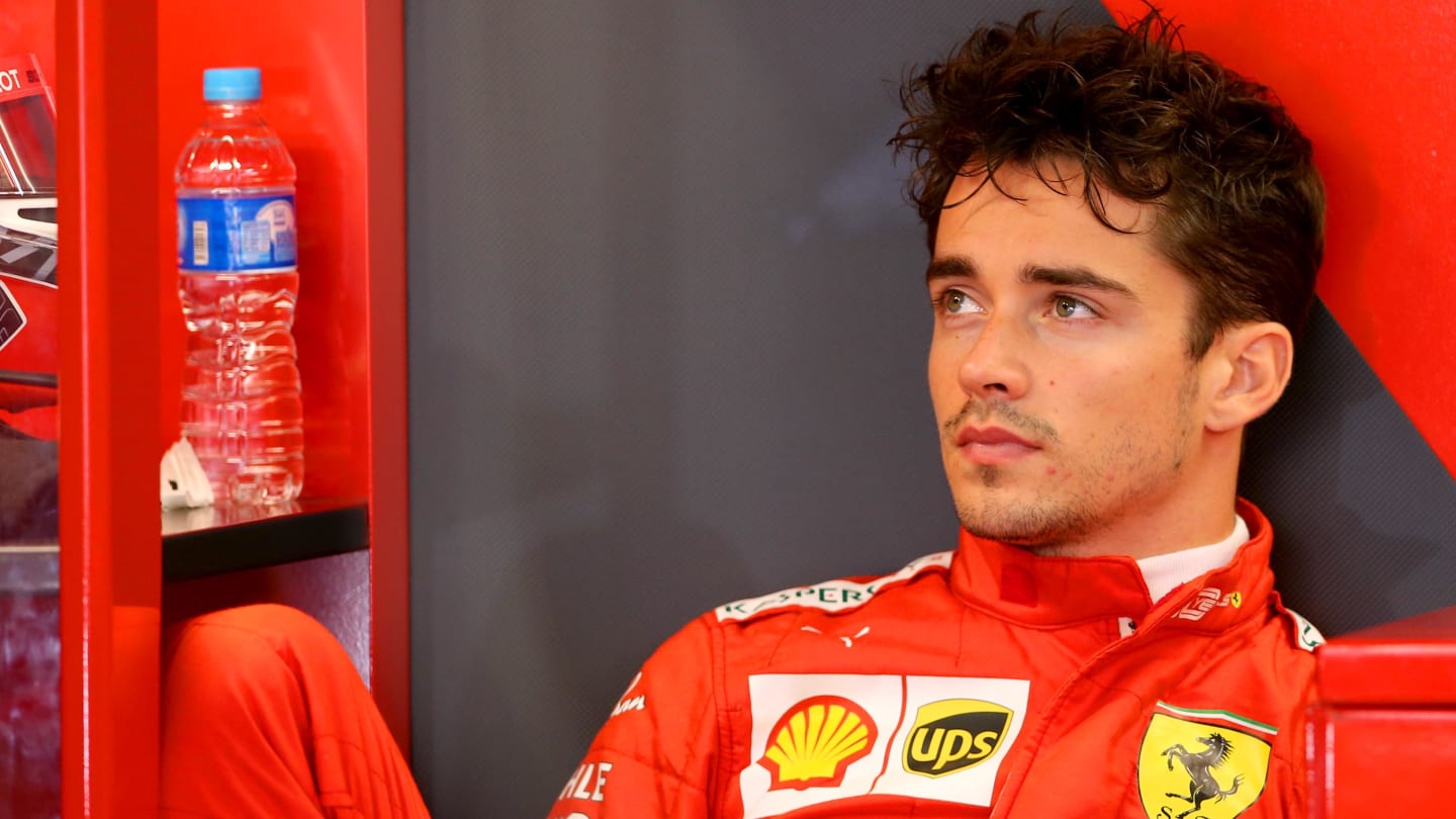 SOCHI, RUSSIA - SEPTEMBER 27: Charles Leclerc of Monaco and Ferrari prepares to drive in the garage