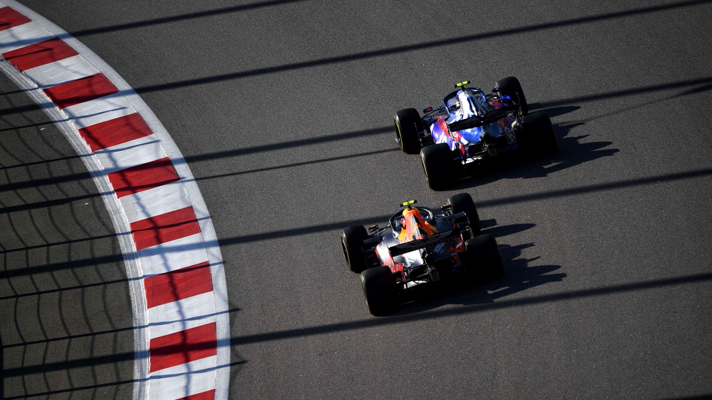 SOCHI, RUSSIA - SEPTEMBER 29: Pierre Gasly of France driving the (10) Scuderia Toro Rosso STR14 Honda and Alexander Albon of Thailand driving the (23) Aston Martin Red Bull Racing RB15 on track during the F1 Grand Prix of Russia at Sochi Autodrom on September 29, 2019 in Sochi, Russia. (Photo by Clive Mason/Getty Images)