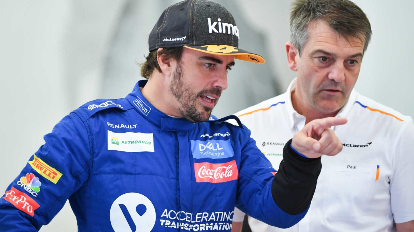 BAHRAIN INTERNATIONAL CIRCUIT, BAHRAIN - APRIL 02: Fernando Alonso, McLaren, talks to a team member