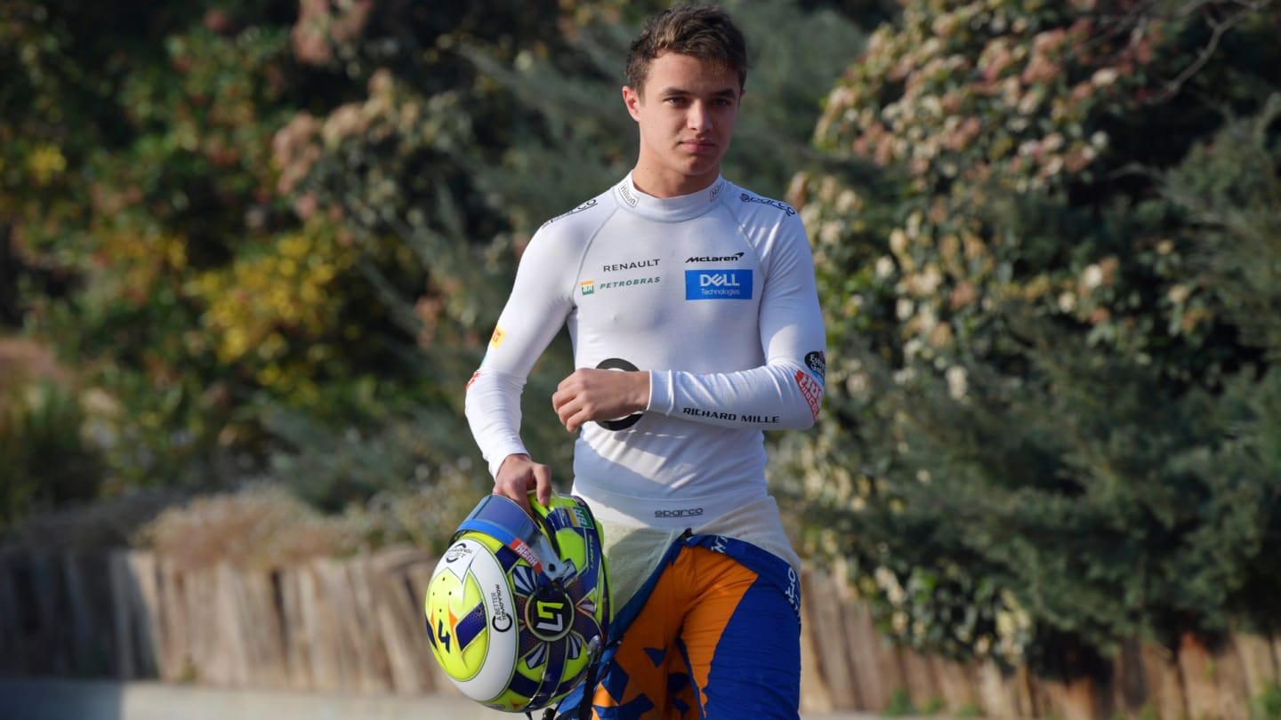 CIRCUIT DE BARCELONA-CATALUNYA, SPAIN - FEBRUARY 21: Lando Norris, McLaren walks in after a trip into the gravel during the Barcelona February testing at Circuit de Barcelona-Catalunya on February 21, 2019 in Circuit de Barcelona-Catalunya, Spain. (Photo by Jerry Andre / Sutton Images)