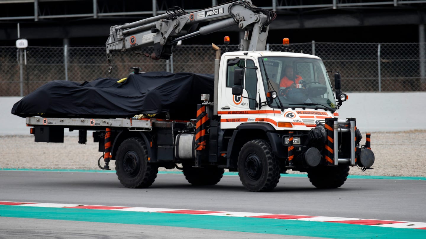 CIRCUIT DE BARCELONA-CATALUNYA, SPAIN - FEBRUARY 20: The car of Romain Grosjean, Haas F1 Team VF-19 is recovered to the pits during the Barcelona February testing at Circuit de Barcelona-Catalunya on February 20, 2019 in Circuit de Barcelona-Catalunya, Spain. (Photo by Mark Sutton / Sutton Images)