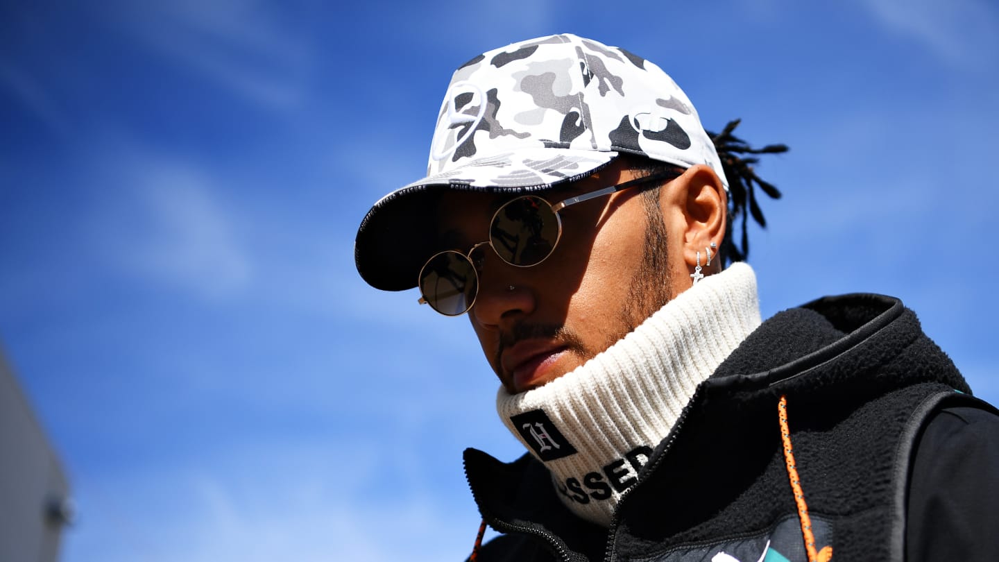 AUSTIN, TEXAS - NOVEMBER 02: Lewis Hamilton of Great Britain and Mercedes GP walks in the Paddock