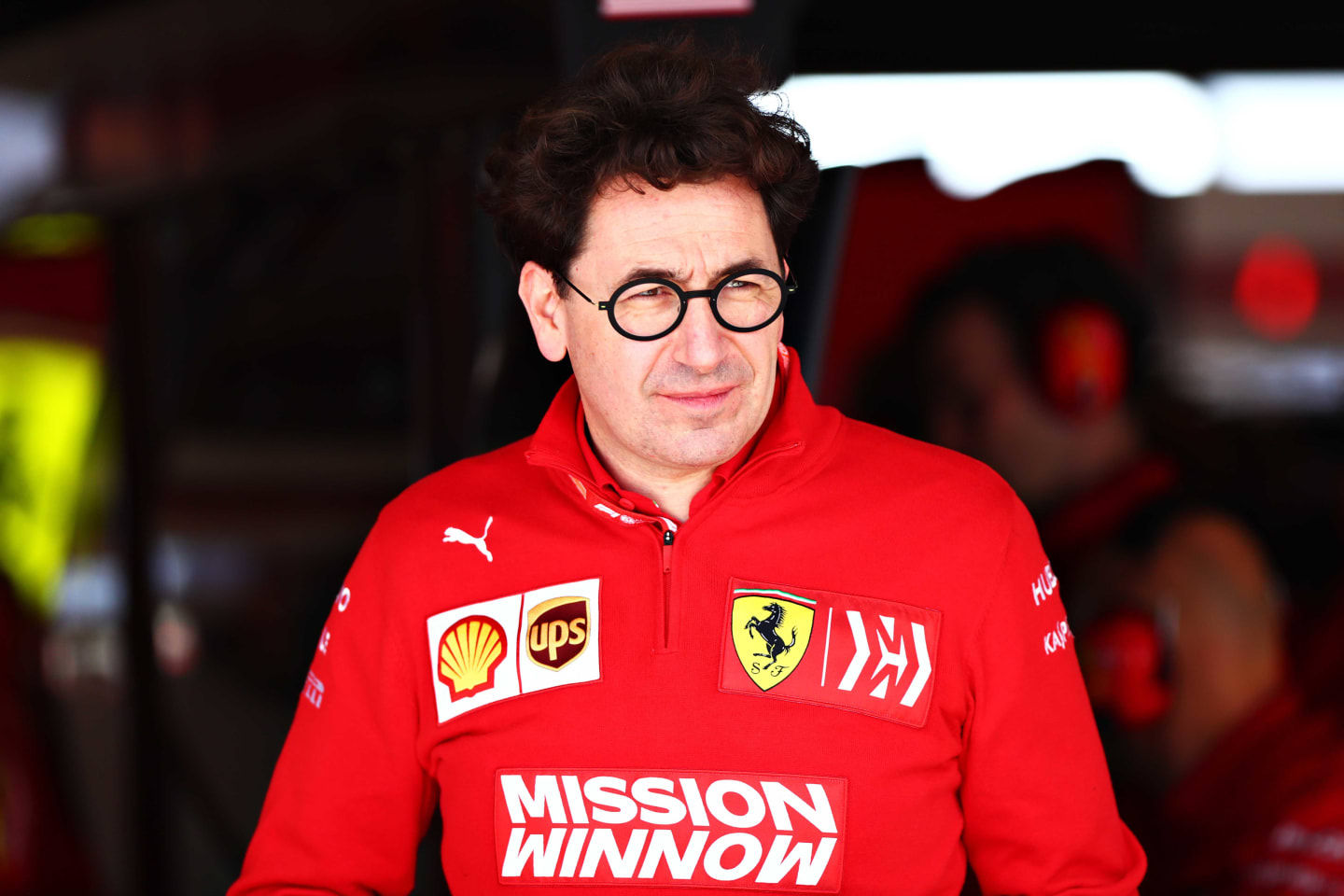 AUSTIN, TEXAS - NOVEMBER 02: Ferrari Team Principal Mattia Binotto looks on in the garage during
