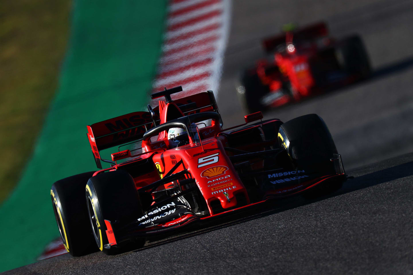 AUSTIN, TEXAS - NOVEMBER 02: Sebastian Vettel of Germany driving the (5) Scuderia Ferrari SF90 leads Charles Leclerc of Monaco driving the (16) Scuderia Ferrari SF90 on track during qualifying for the F1 Grand Prix of USA at Circuit of The Americas on November 02, 2019 in Austin, Texas. (Photo by Dan Istitene/Getty Images)