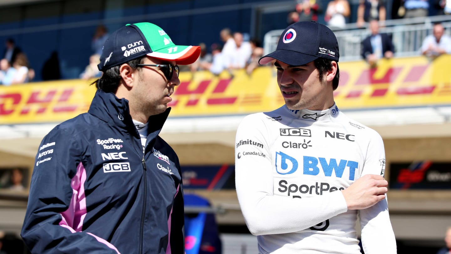 AUSTIN, TEXAS - NOVEMBER 03: Sergio Perez of Mexico and Racing Point and Lance Stroll of Canada and Racing Point talk before the F1 Grand Prix of USA at Circuit of The Americas on November 03, 2019 in Austin, Texas. (Photo by Charles Coates/Getty Images)