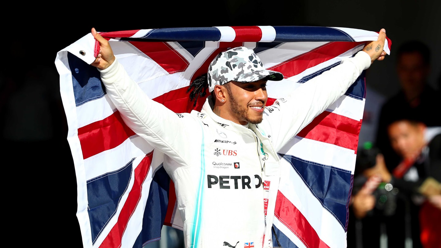 AUSTIN, TEXAS - NOVEMBER 03: 2019 Formula One World Drivers Champion Lewis Hamilton of Great Britain and Mercedes GP celebrates in parc ferme during the F1 Grand Prix of USA at Circuit of The Americas on November 03, 2019 in Austin, Texas. (Photo by Mark Thompson/Getty Images)