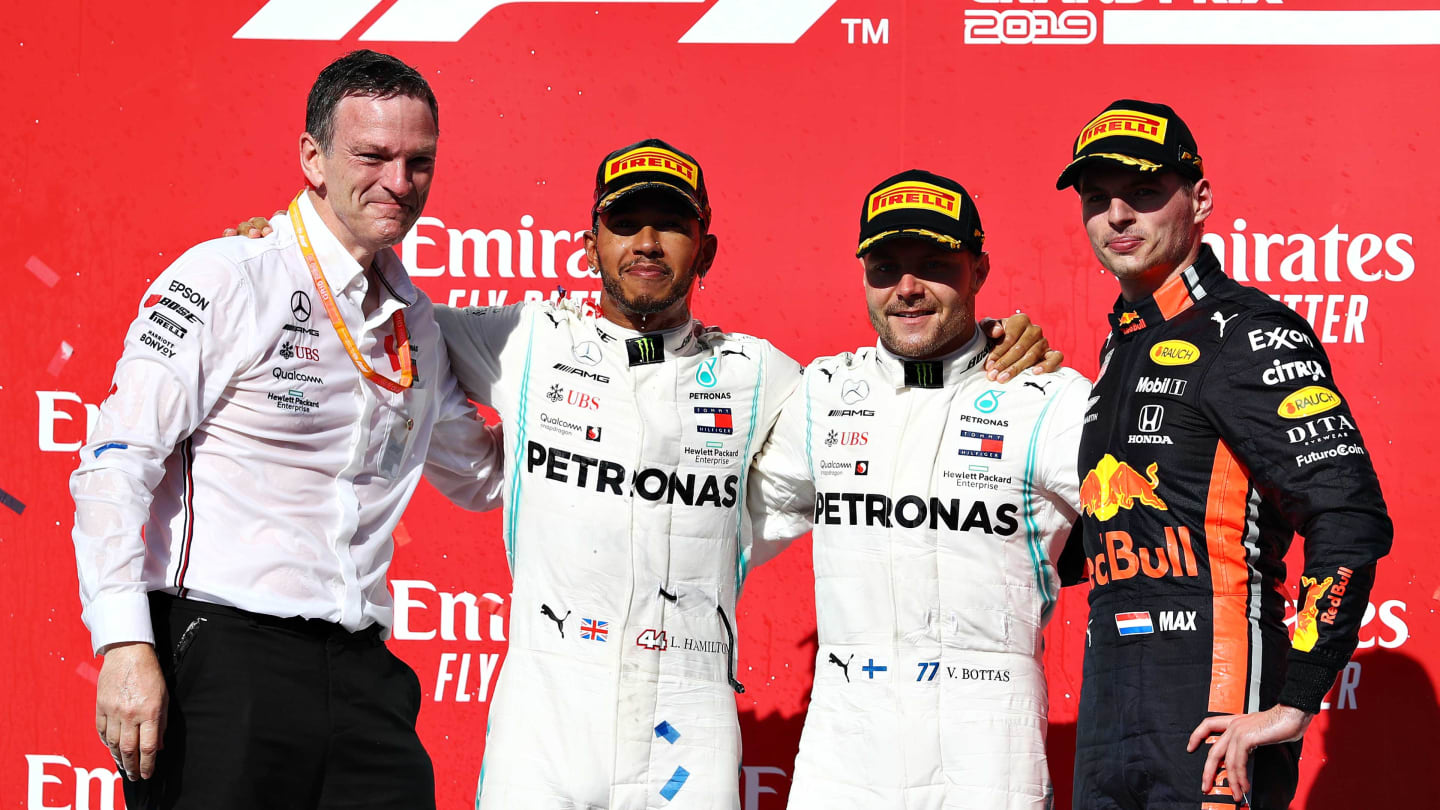 AUSTIN, TEXAS - NOVEMBER 03: Top three finishers Valtteri Bottas of Finland and Mercedes GP, Lewis