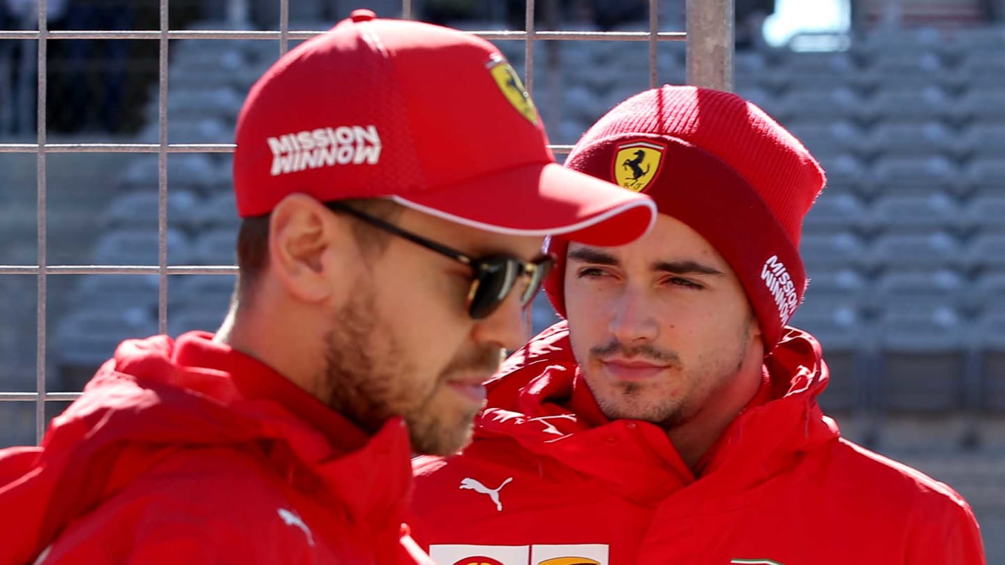 AUSTIN, TEXAS - OCTOBER 31: Charles Leclerc of Monaco and Ferrari and Sebastian Vettel of Germany