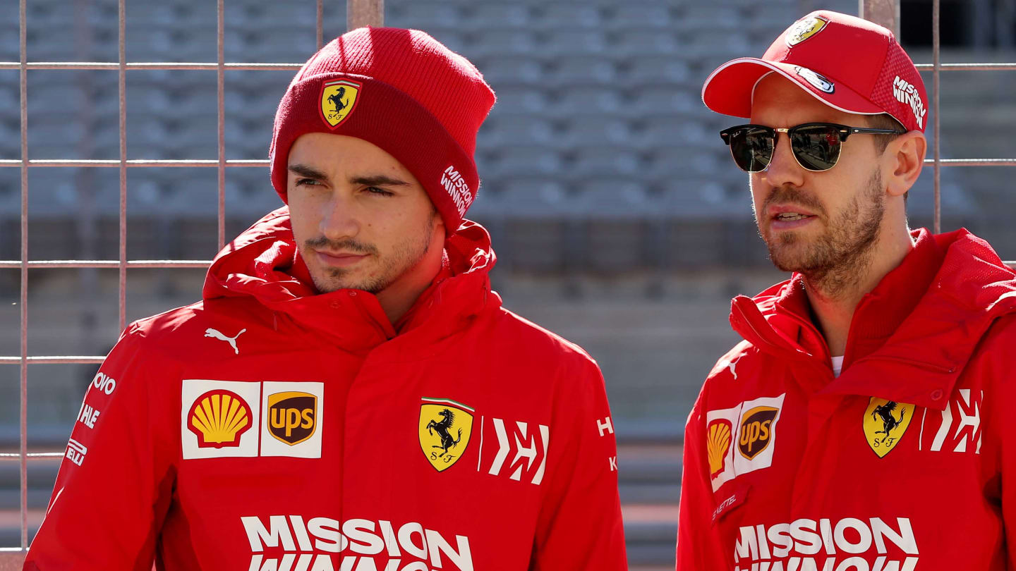 AUSTIN, TEXAS - OCTOBER 31: Charles Leclerc of Monaco and Ferrari and Sebastian Vettel of Germany