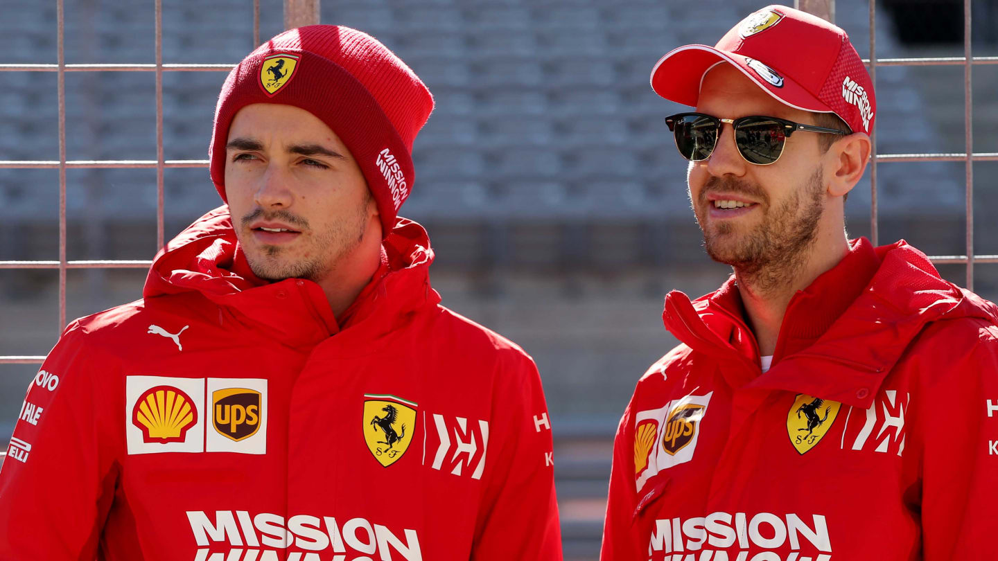 AUSTIN, TEXAS - OCTOBER 31: Charles Leclerc of Monaco and Ferrari and Sebastian Vettel of Germany