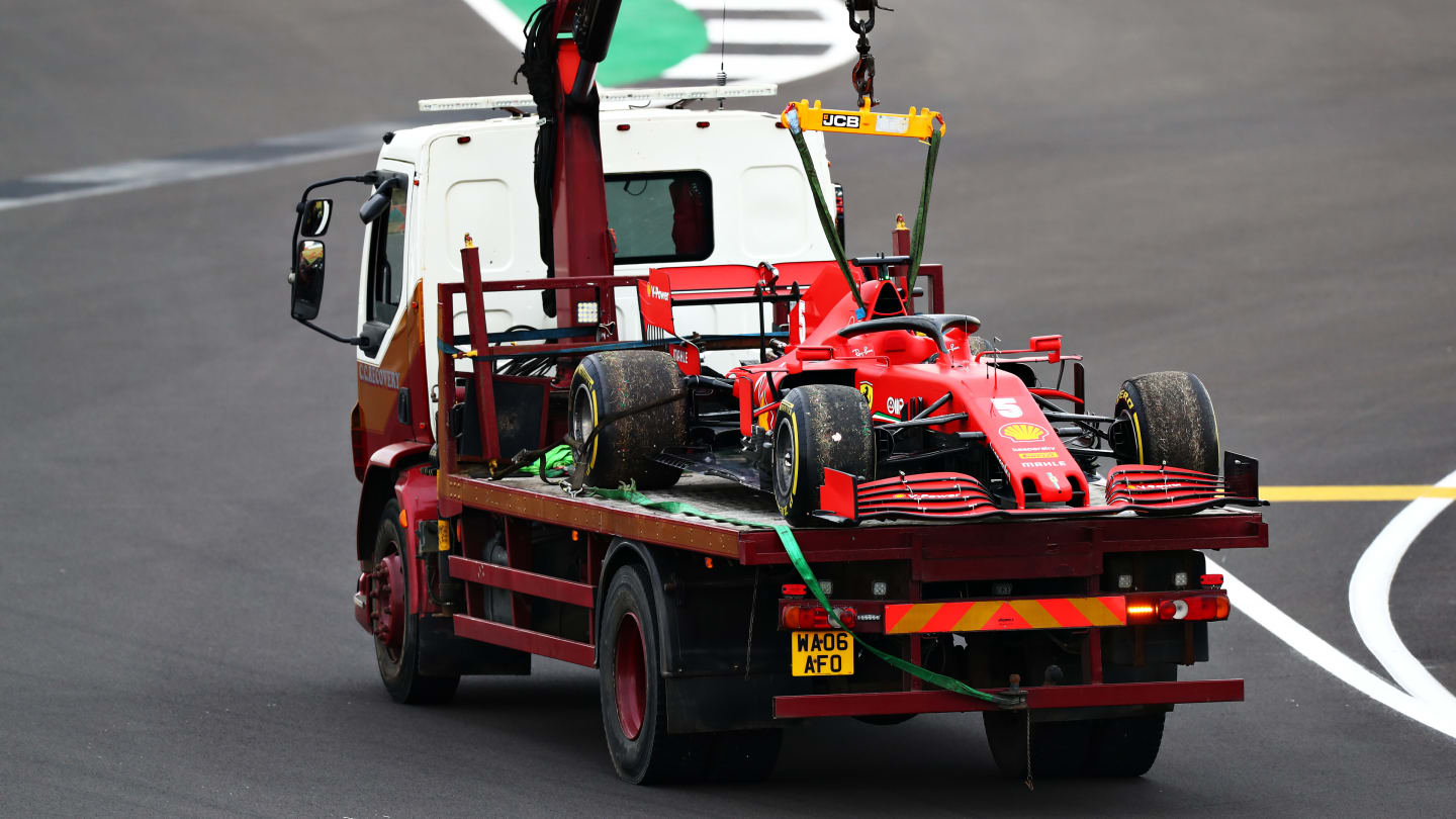 NORTHAMPTON, ENGLAND - AUGUST 07: The broken down car of Sebastian Vettel of Germany and Ferrari is taken back to the pits during practice for the F1 70th Anniversary Grand Prix at Silverstone on August 07, 2020 in Northampton, England. (Photo by Dan Istitene - Formula 1/Formula 1 via Getty Images)