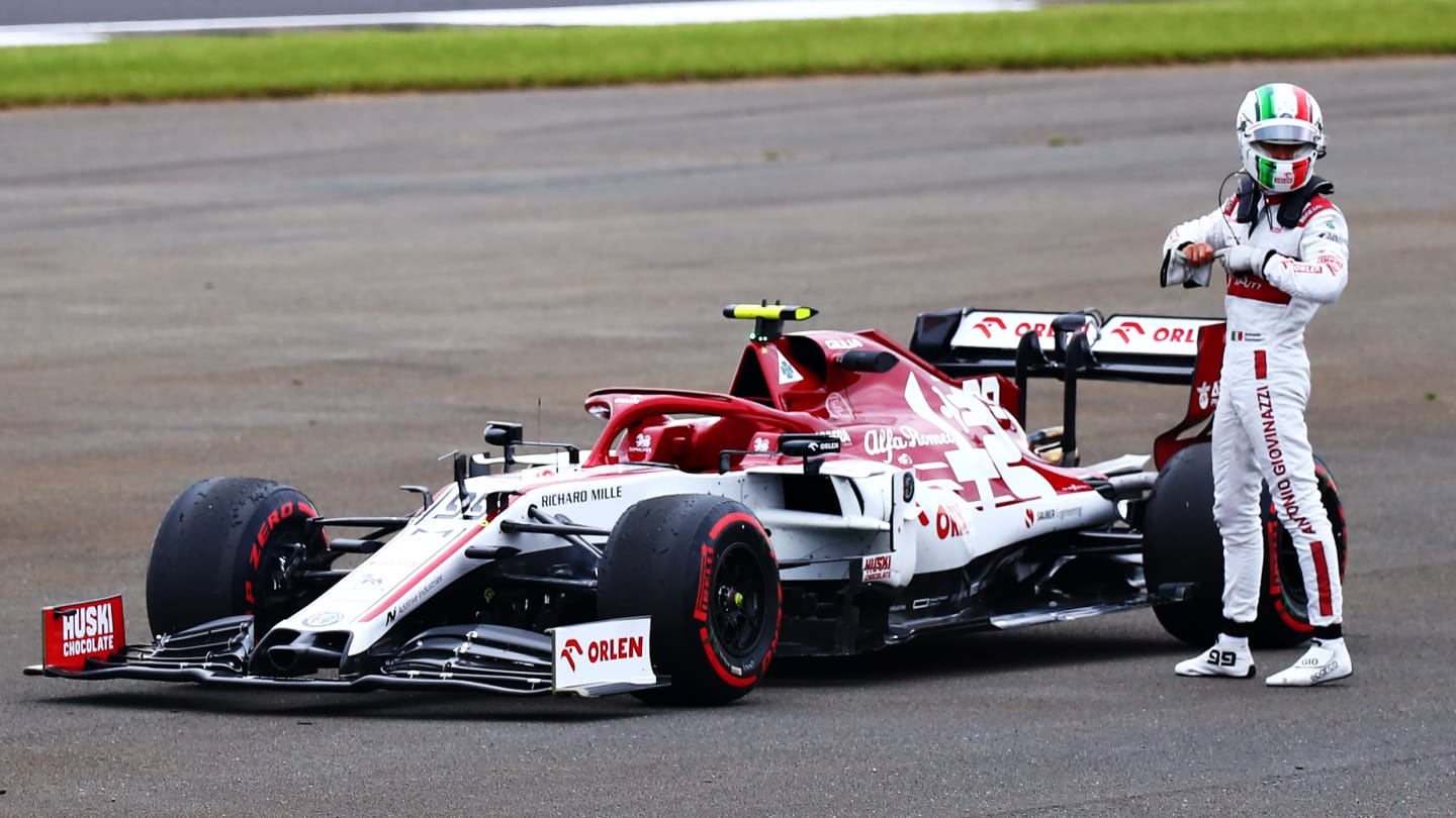 NORTHAMPTON, ENGLAND - AUGUST 07: Antonio Giovinazzi of Italy and Alfa Romeo Racing walks from his car after stopping on track during practice for the F1 70th Anniversary Grand Prix at Silverstone on August 07, 2020 in Northampton, England. (Photo by Dan Istitene - Formula 1/Formula 1 via Getty Images)