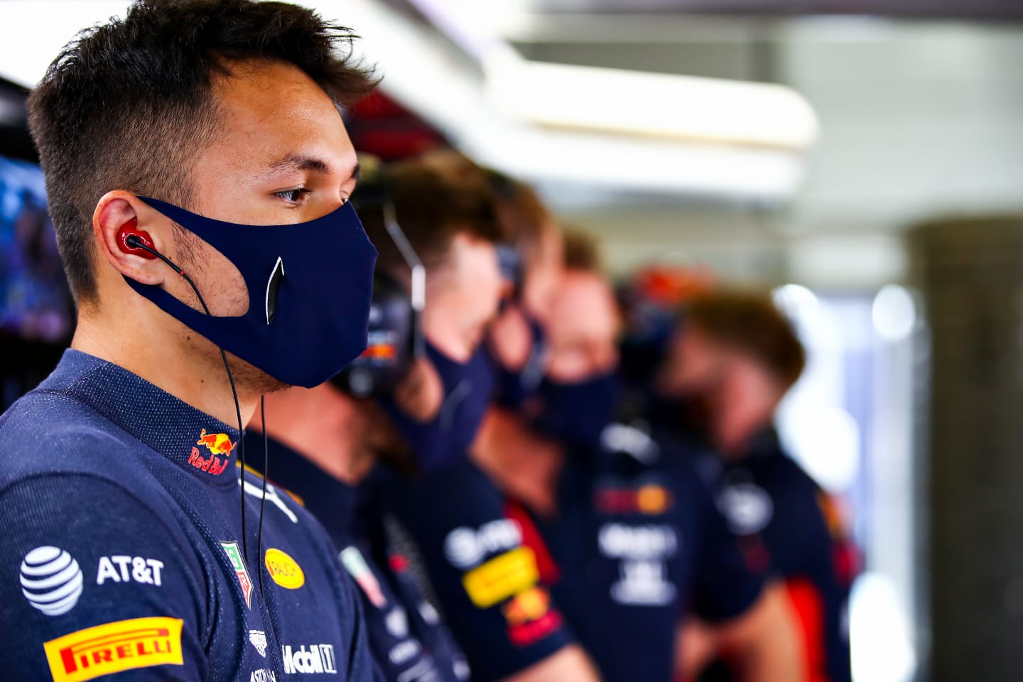 NORTHAMPTON, ENGLAND - AUGUST 08: Alexander Albon of Thailand and Red Bull Racing looks on in the