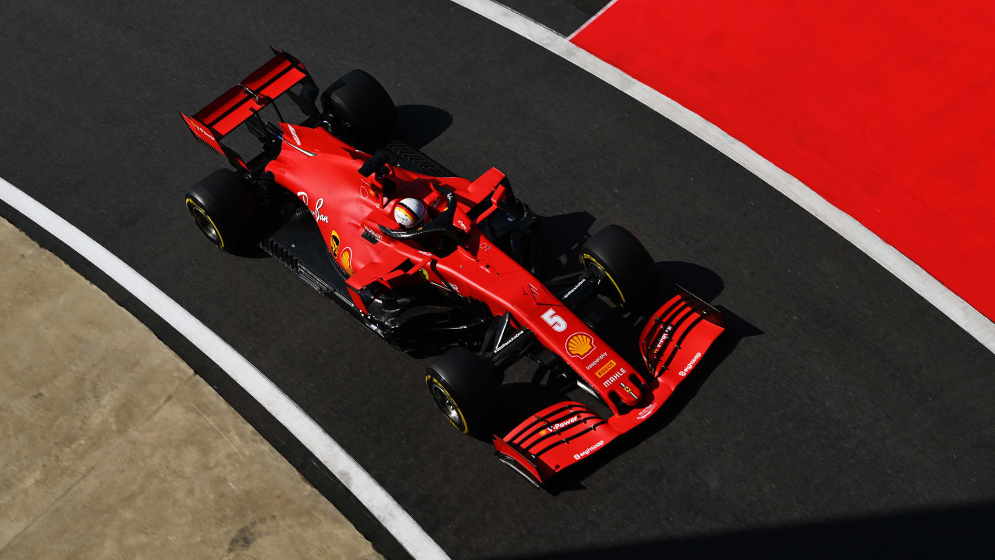 NORTHAMPTON, ENGLAND - AUGUST 08: Sebastian Vettel of Germany driving the (5) Scuderia Ferrari