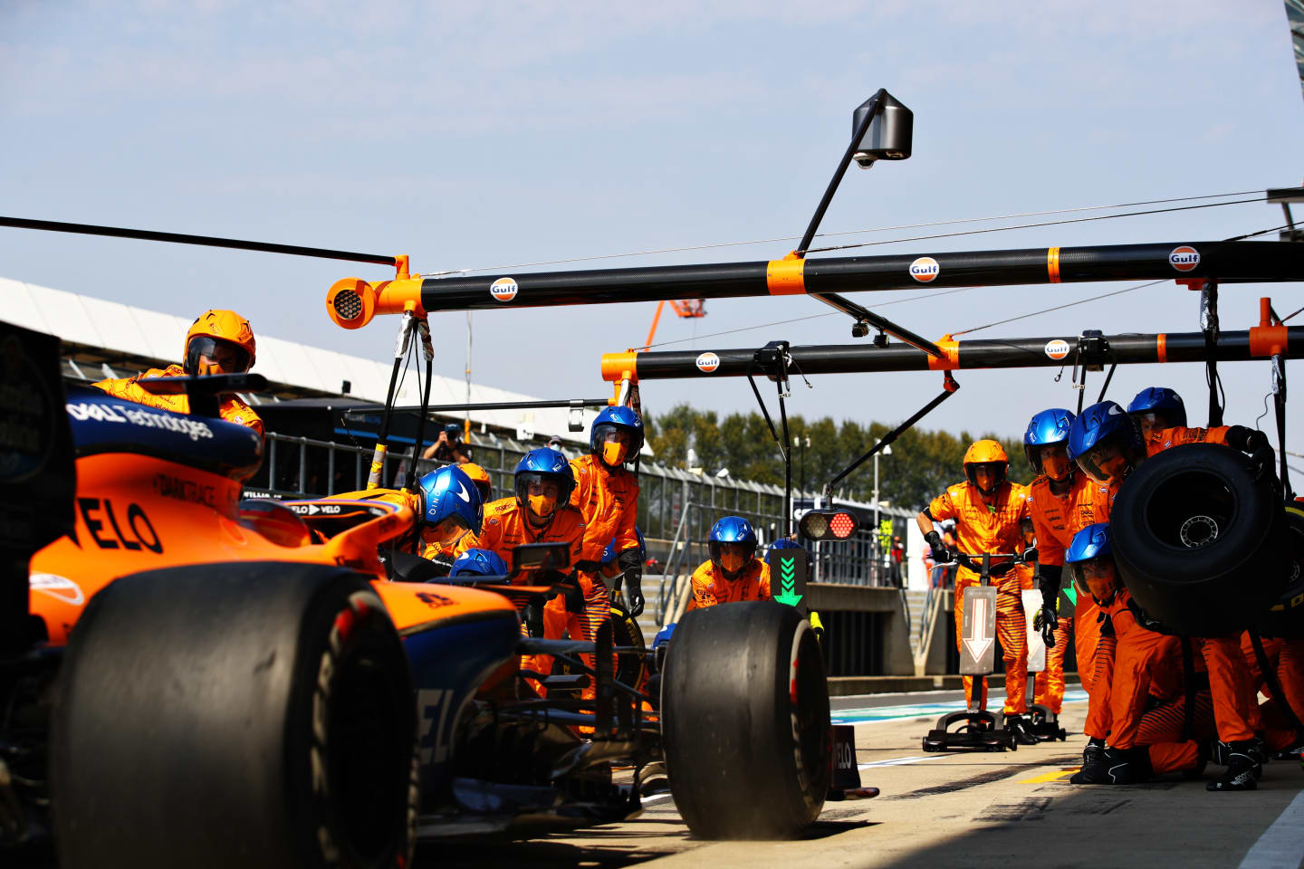 NORTHAMPTON, ENGLAND - AUGUST 09: Carlos Sainz of Spain driving the (55) McLaren F1 Team MCL35