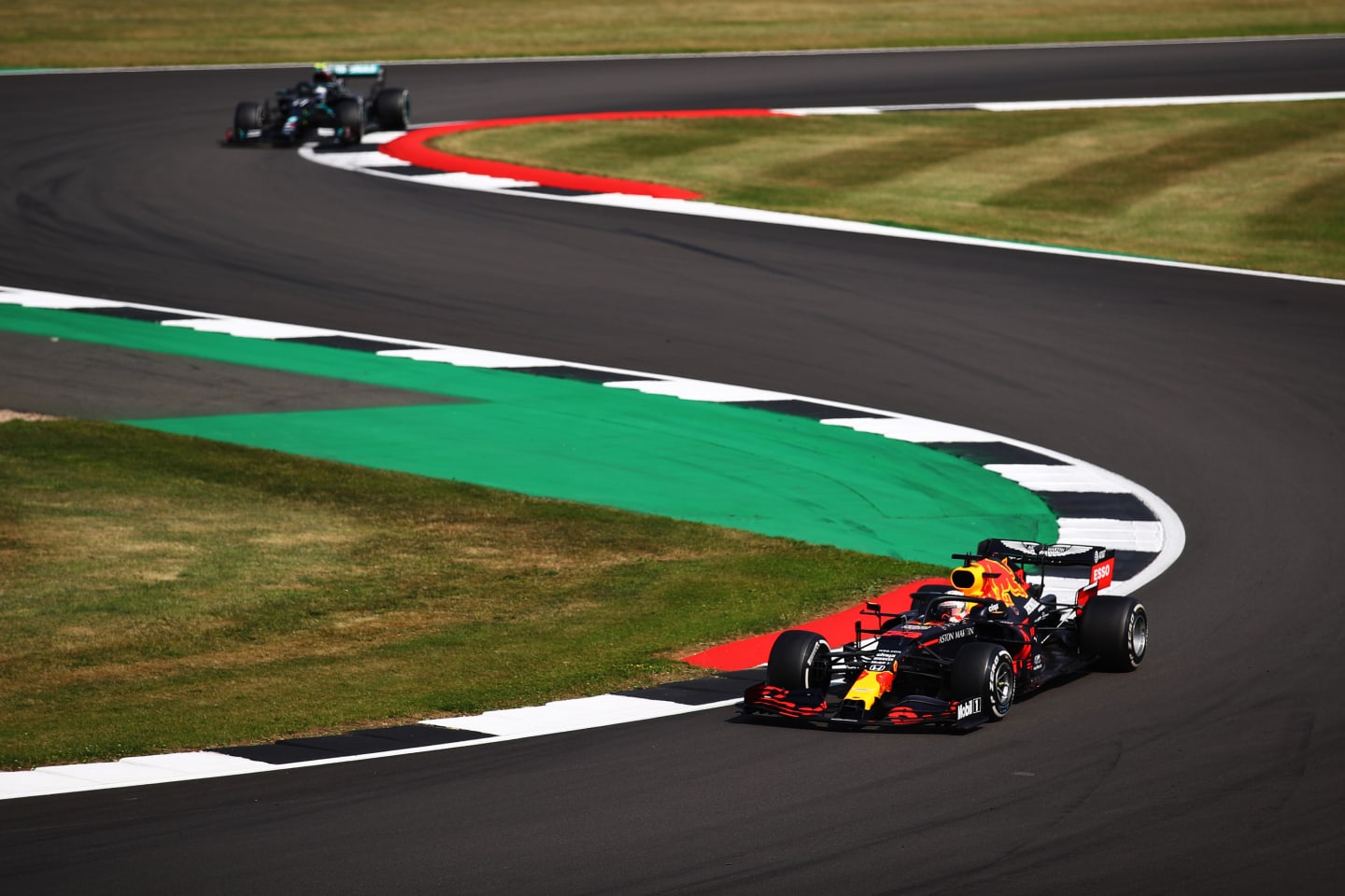 NORTHAMPTON, ENGLAND - AUGUST 09: Max Verstappen of the Netherlands driving the (33) Aston Martin