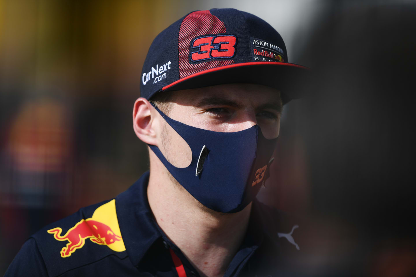 NORTHAMPTON, ENGLAND - AUGUST 06: Max Verstappen of Netherlands and Red Bull Racing talks to the