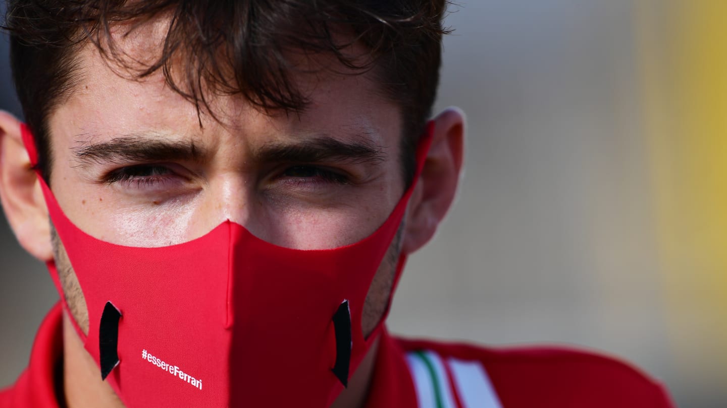NORTHAMPTON, ENGLAND - AUGUST 06: Charles Leclerc of Monaco and Ferrari looks on in the Paddock