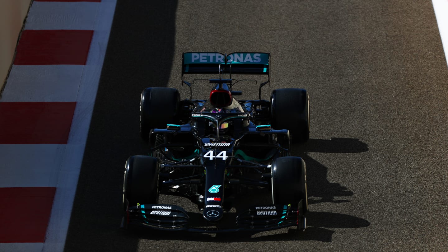 ABU DHABI, UNITED ARAB EMIRATES - DECEMBER 11: Lewis Hamilton of Great Britain driving the (44)