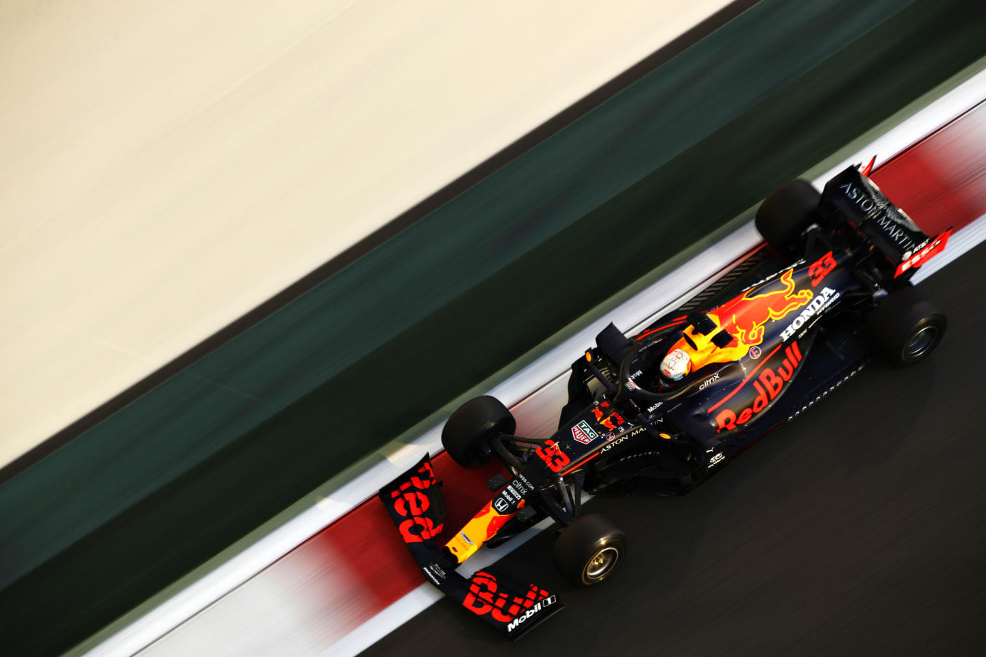 ABU DHABI, UNITED ARAB EMIRATES - DECEMBER 11: Max Verstappen of the Netherlands driving the (33) Aston Martin Red Bull Racing RB16 during practice ahead of the F1 Grand Prix of Abu Dhabi at Yas Marina Circuit on December 11, 2020 in Abu Dhabi, United Arab Emirates. (Photo by Mark Thompson/Getty Images)