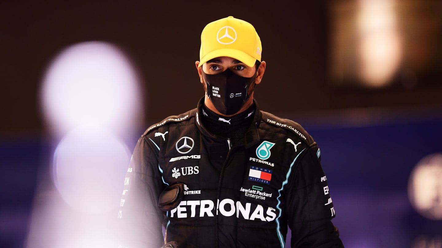 ABU DHABI, UNITED ARAB EMIRATES - DECEMBER 12: Third place qualifier Lewis Hamilton of Great Britain and Mercedes GP looks on in parc ferme during qualifying ahead of the F1 Grand Prix of Abu Dhabi at Yas Marina Circuit on December 12, 2020 in Abu Dhabi, United Arab Emirates. (Photo by Mario Renzi - Formula 1/Formula 1 via Getty Images)