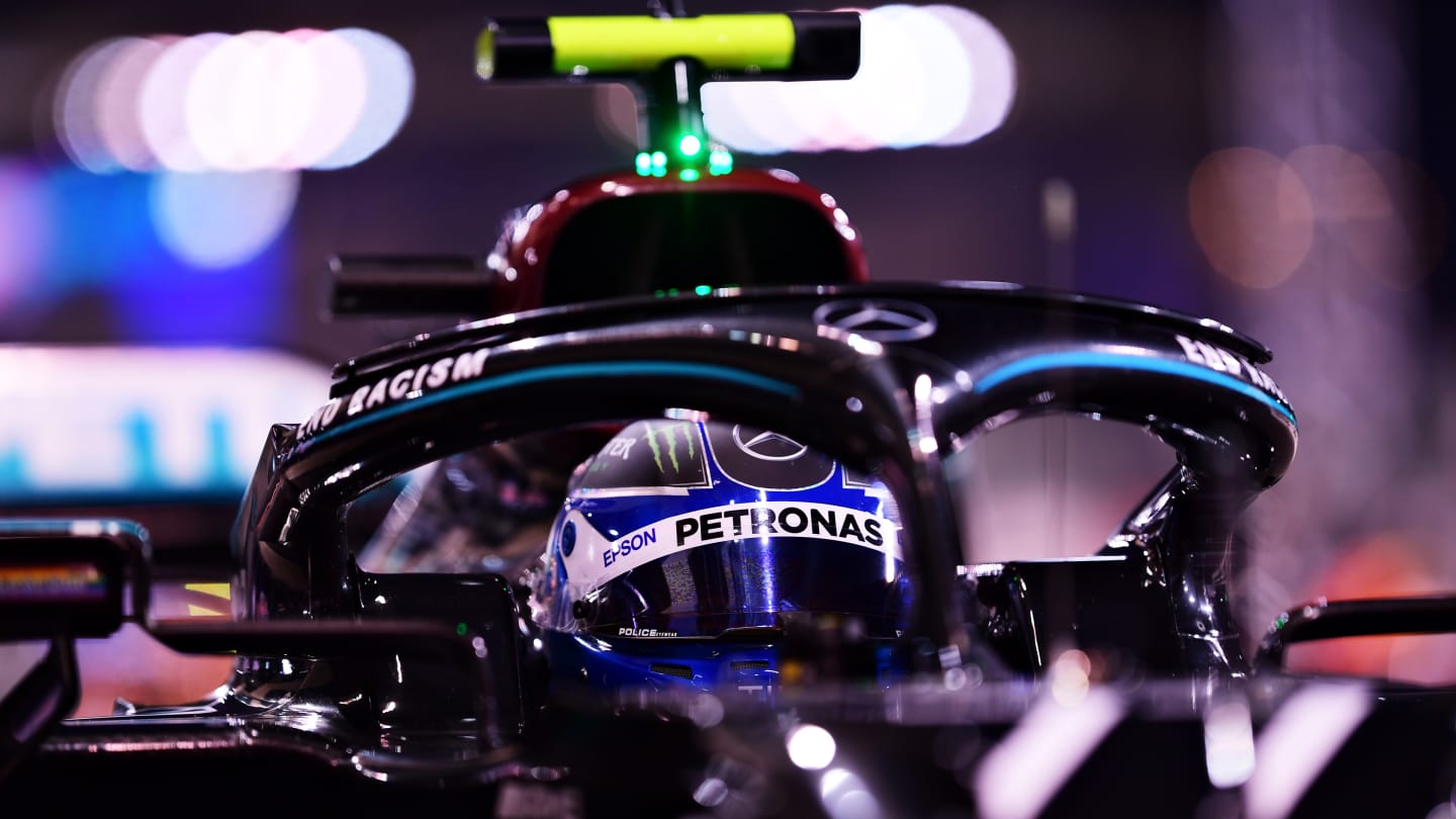 ABU DHABI, UNITED ARAB EMIRATES - DECEMBER 12: Second place qualifier Valtteri Bottas of Finland and Mercedes GP stops in parc ferme during qualifying ahead of the F1 Grand Prix of Abu Dhabi at Yas Marina Circuit on December 12, 2020 in Abu Dhabi, United Arab Emirates. (Photo by Mario Renzi - Formula 1/Formula 1 via Getty Images)