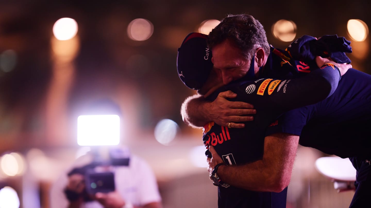 ABU DHABI, UNITED ARAB EMIRATES - DECEMBER 12: Pole position qualifier Max Verstappen of Netherlands and Red Bull Racing celebrates with Red Bull Racing Team Principal Christian Horner in parc ferme during qualifying ahead of the F1 Grand Prix of Abu Dhabi at Yas Marina Circuit on December 12, 2020 in Abu Dhabi, United Arab Emirates. (Photo by Mario Renzi - Formula 1/Formula 1 via Getty Images)